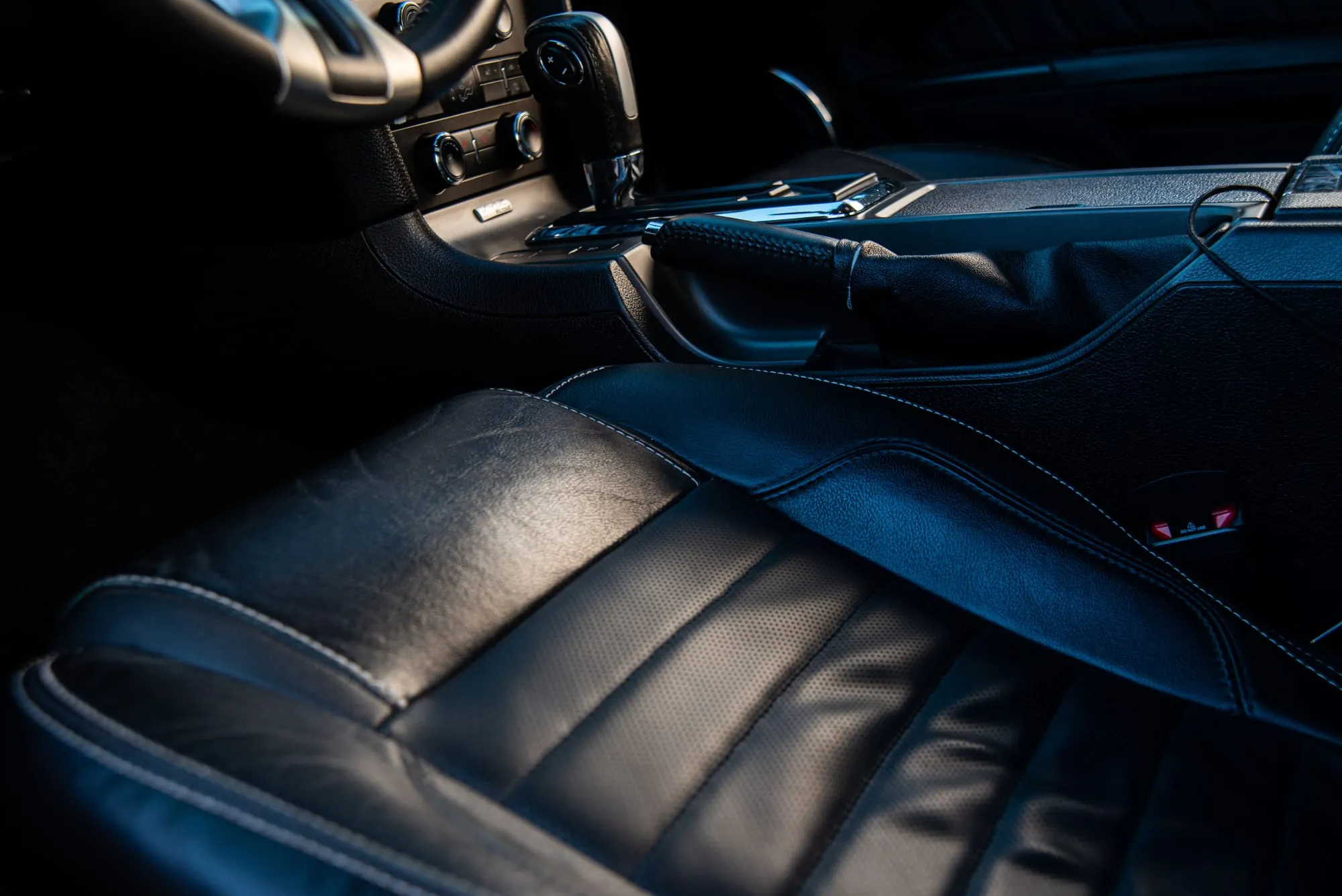 Black leather seats in a luxury car interior