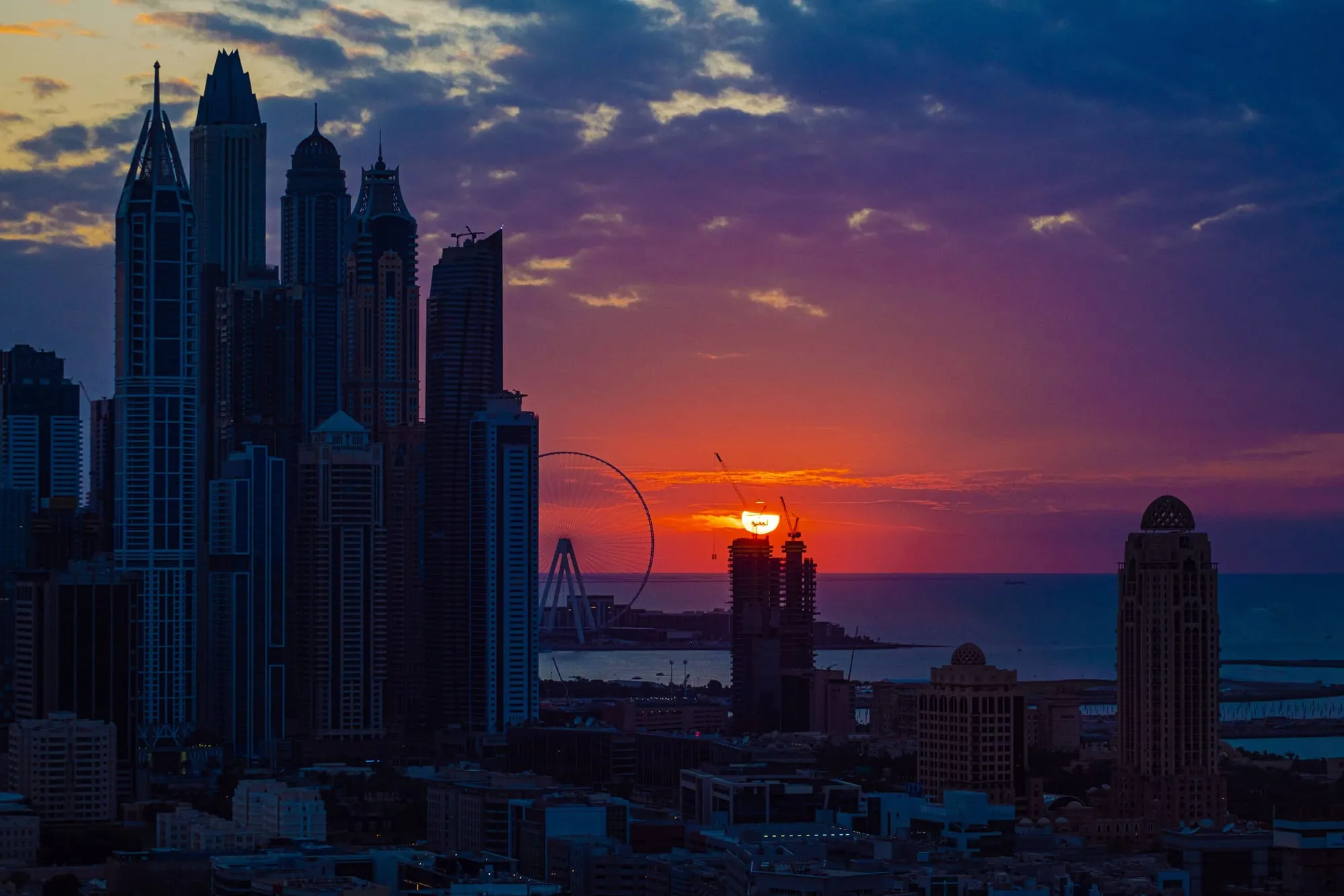 Dubai Marina towers at sunset