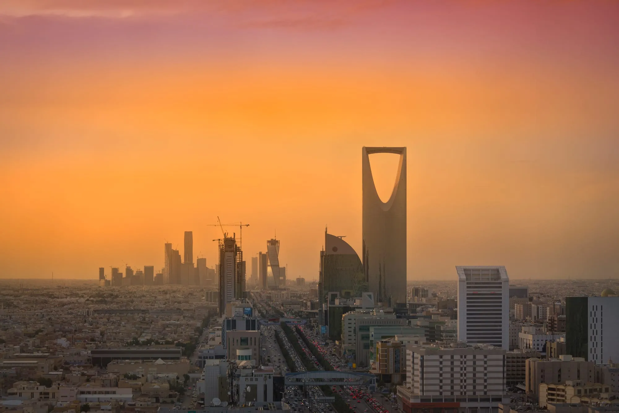 Riyadh skyline at sunset with Kingdom Centre tower