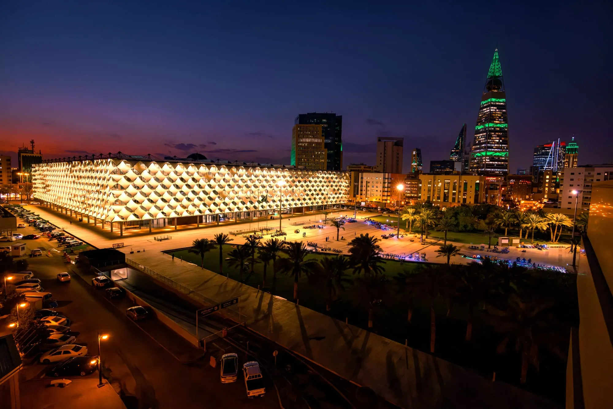 Illuminated mixed-use development at night