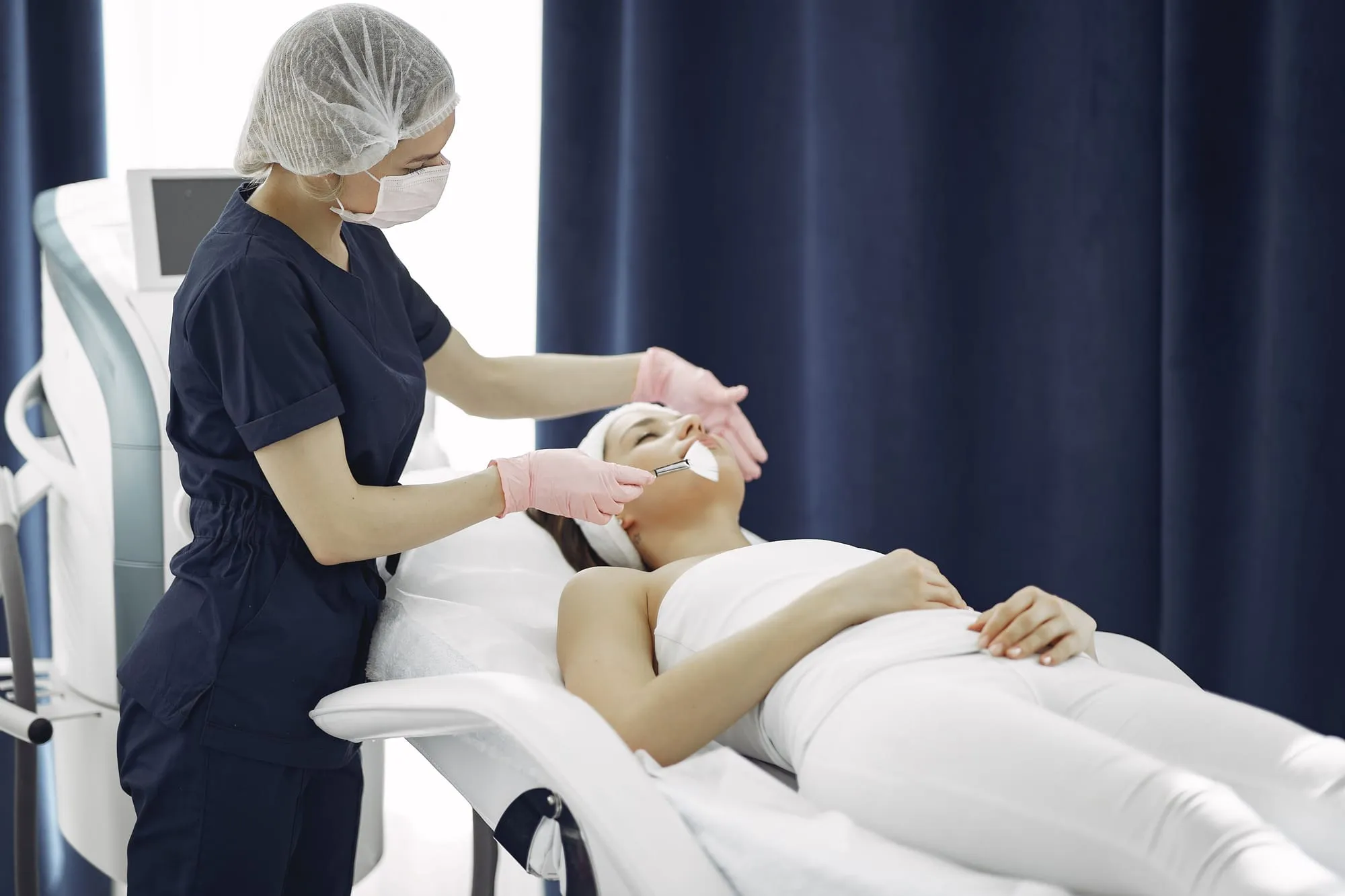 Dermatologist performing a skin treatment
